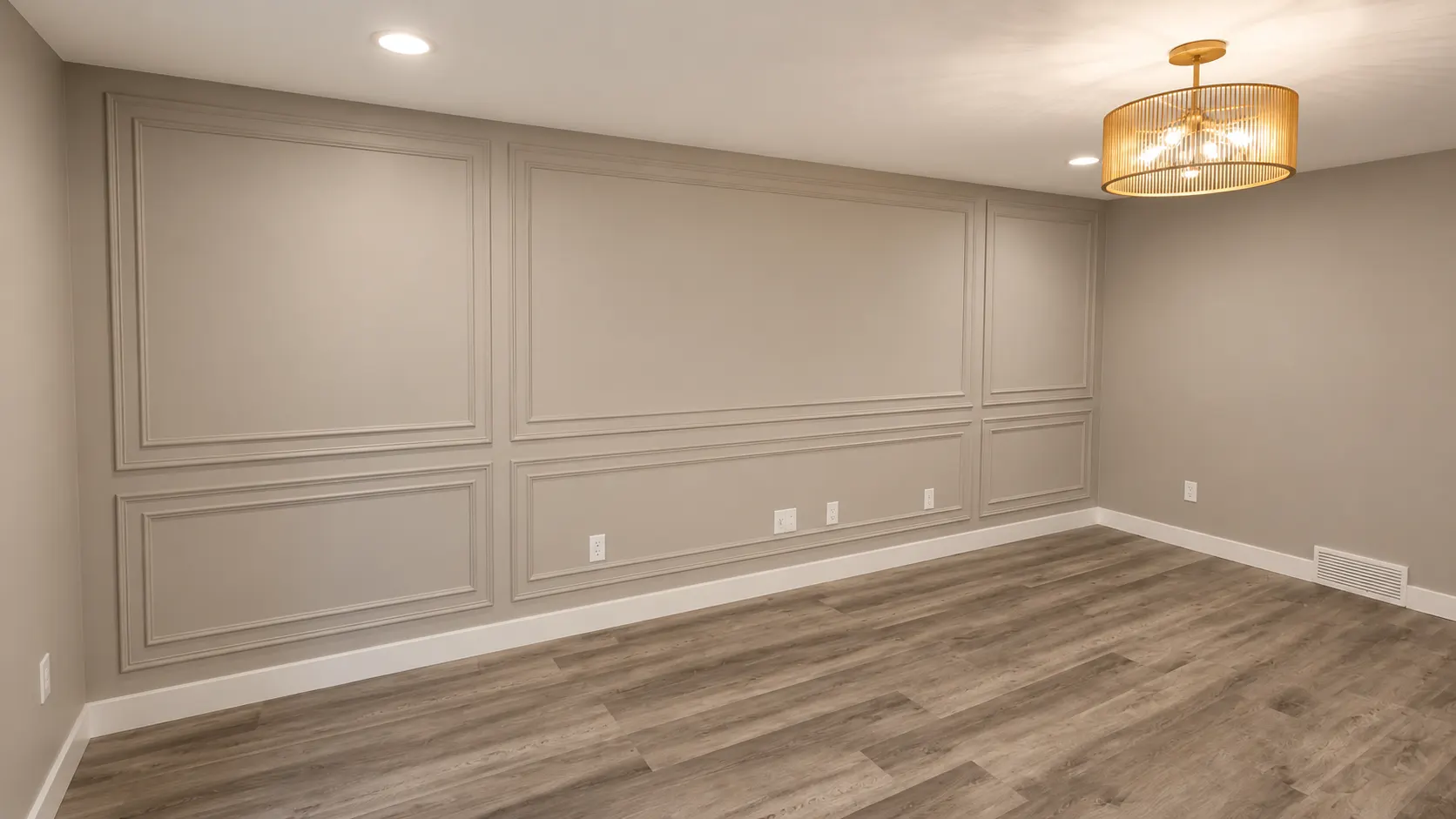 A picture-frame moulding feature wall in a Canyon Meadows renovation, Calgary